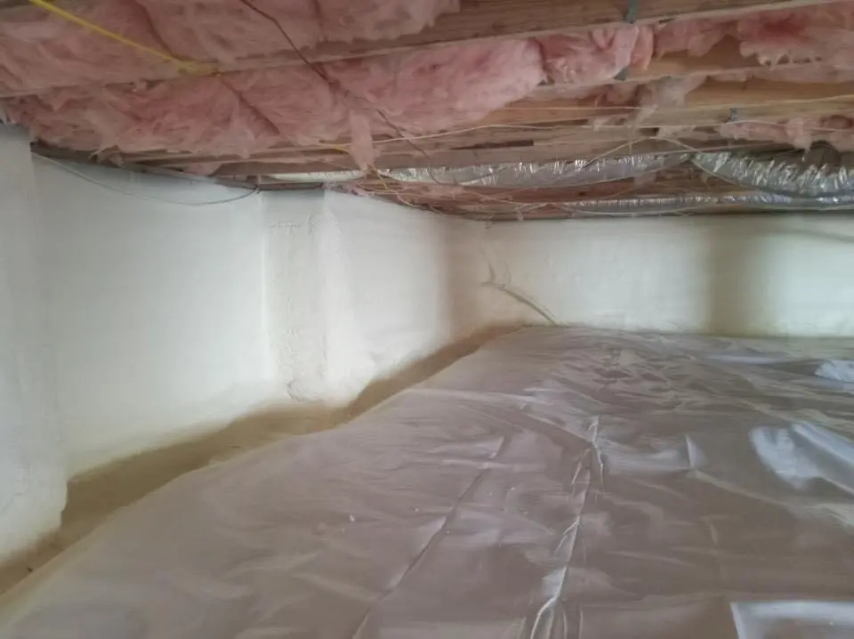 Crawl space encapsulation with closed-cell spray foam for Flat Roof Repair in Millis
